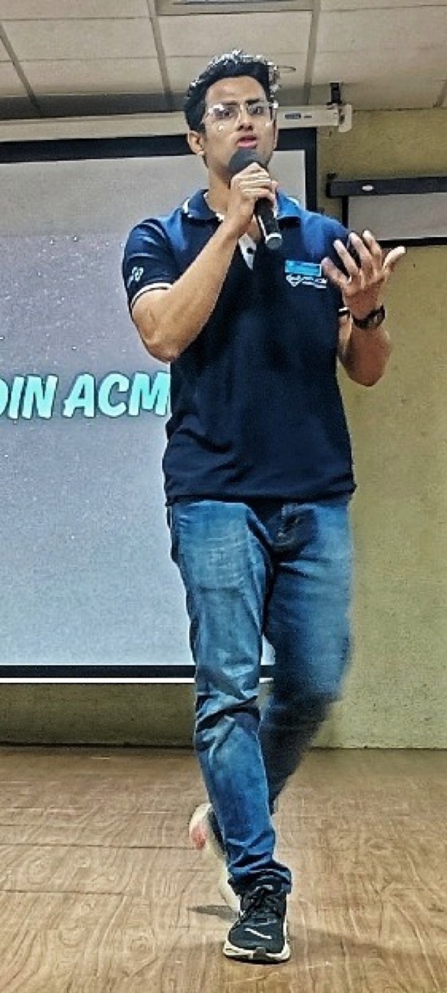 Vedant Somani speaking on stage